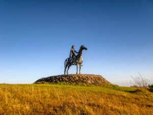 Metal art sculpture of a gaelic chieftain riding a horse in Roscommon.