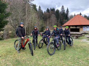 Group of people stood mounting e-bikes in Slovenia